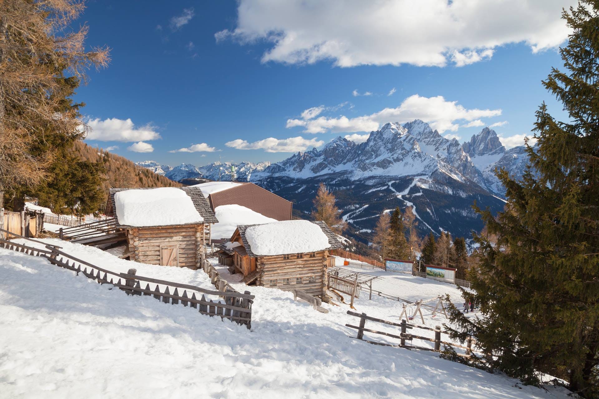Classic winter postcard view of the Monte Elmo peak in the Italian Dolomites during the snowy season.