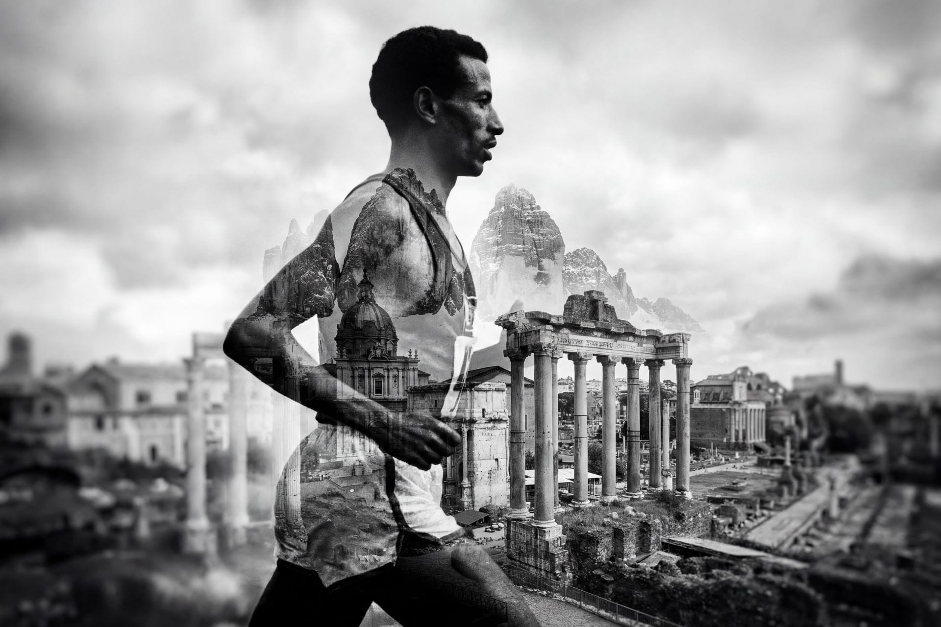 Artistic double exposure silhouette of a 1960s marathon runner filled with a landscape of snowy Dolomite mountains and ancient Roman travertine ruins.